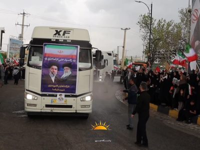 رژه خودرویی حماسی کامیون‌داران فسا زیر باران